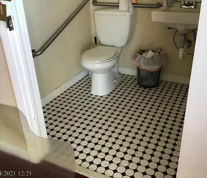 Water damage in small bathroom