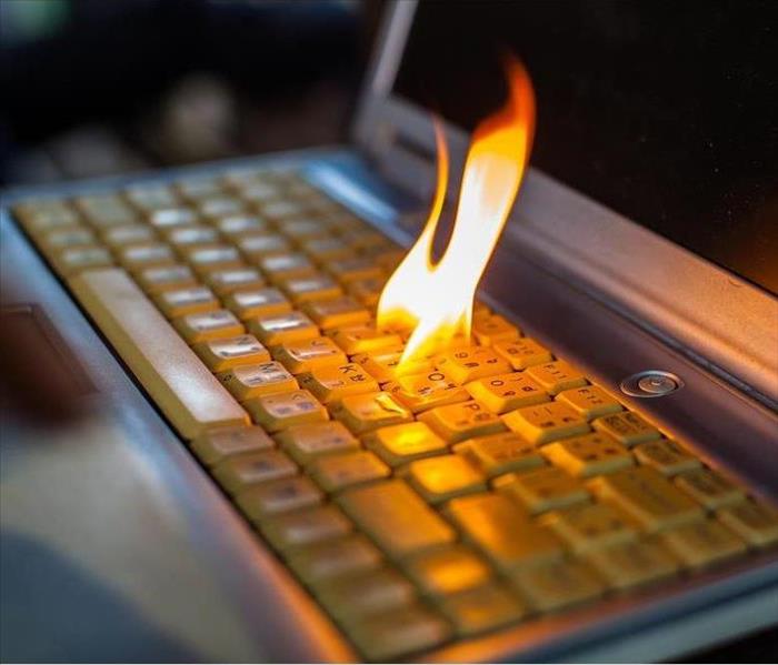 Computer laptop sleeve is on fire. 