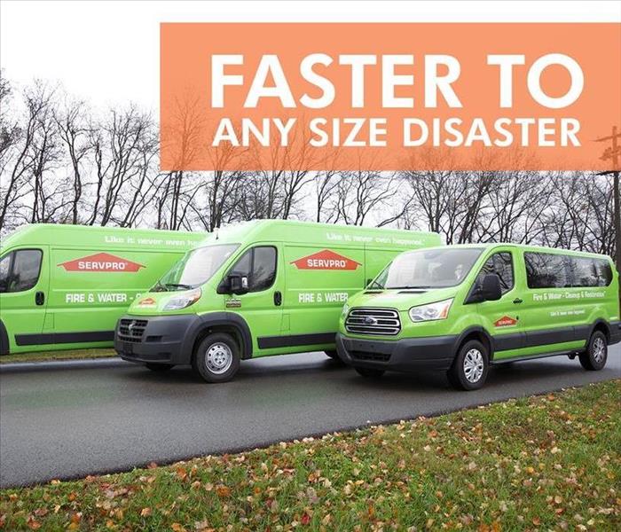 SERVPRO green vehicle with large fonts saying Faster to any Size Disaster